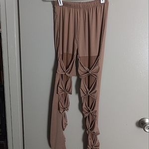 Women's Fancy Leggings with very elite gold ringed access in front..